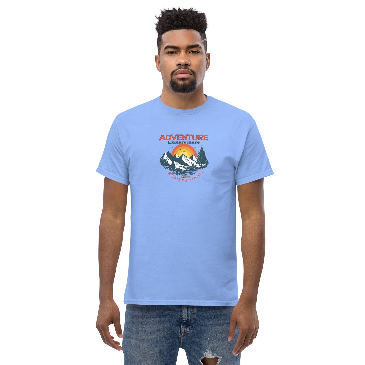 Light blue t-shirt with mountain graphic.